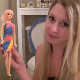 A cute and innocent-looking blonde girl shows us her darker side by taking a piss and a massive shit on her Barbie doll held captive in the toilet beneath her ass. Nice, between the legs perspective. Over 5 minutes.